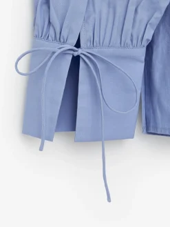 Bluse mit Latzeinsatz aus Baumwolle und Viskose