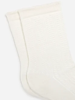 Socken im Pointelle-Strick